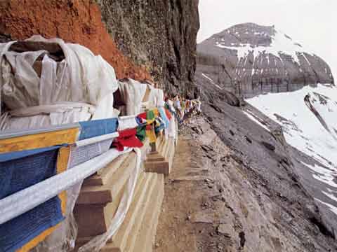
The 13 Golden Chortens are chisseled out of a rock face at about 5944m on Kailash Inner Kora - Sacred Landscape And Pilgrimage in Tibet book
